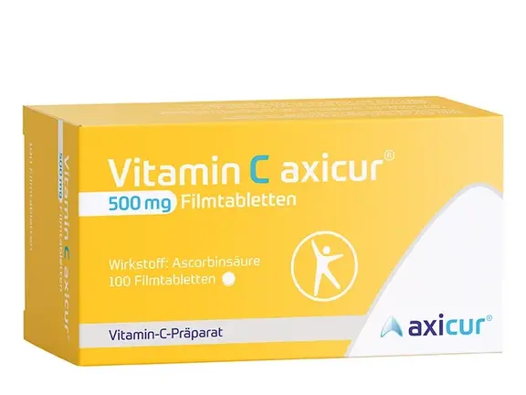 Eine gelb-weiße Schachtel mit Vitamin C axicur 500 mg Filmtabletten, die 100 Tabletten der Marke axicur enthält.